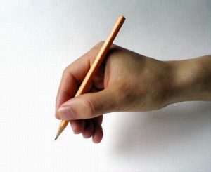 1733-closeup-of-a-hand-holding-a-pencil-pv